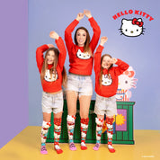 Hello Kitty knee high socks by MADMIA with 3D plush character head and red bow design
