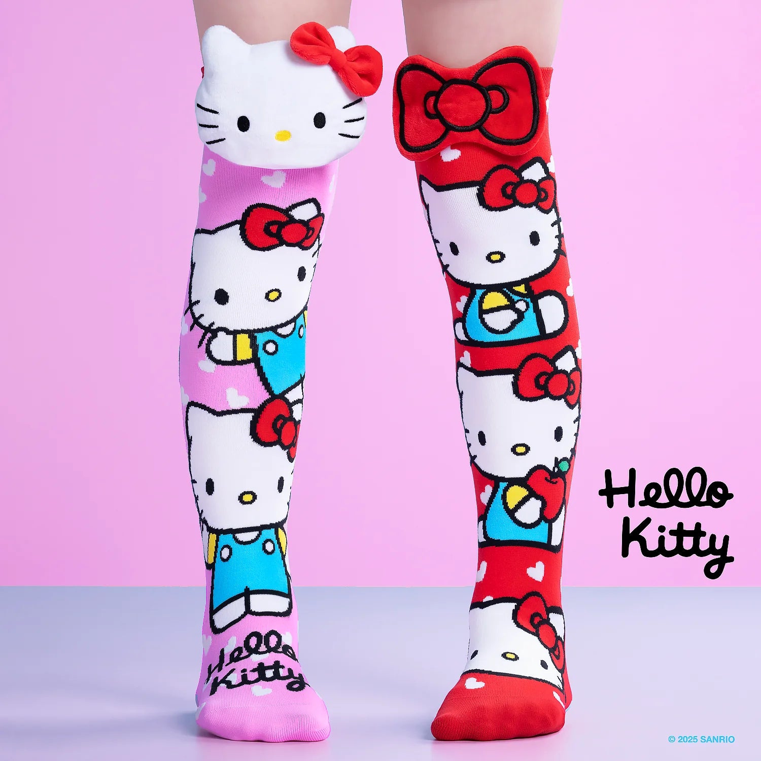 Hello Kitty knee high socks by MADMIA with 3D plush character head and red bow design