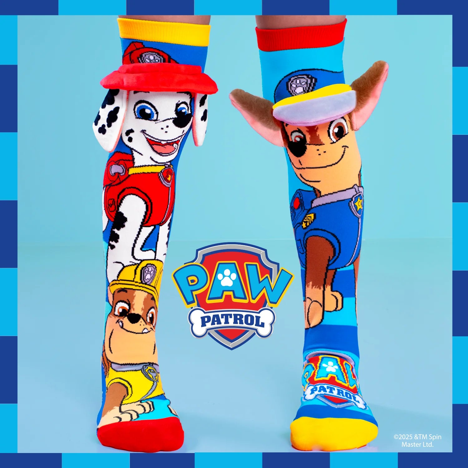 Kids wearing MADMIA Paw Patrol knee high character socks with 3D features