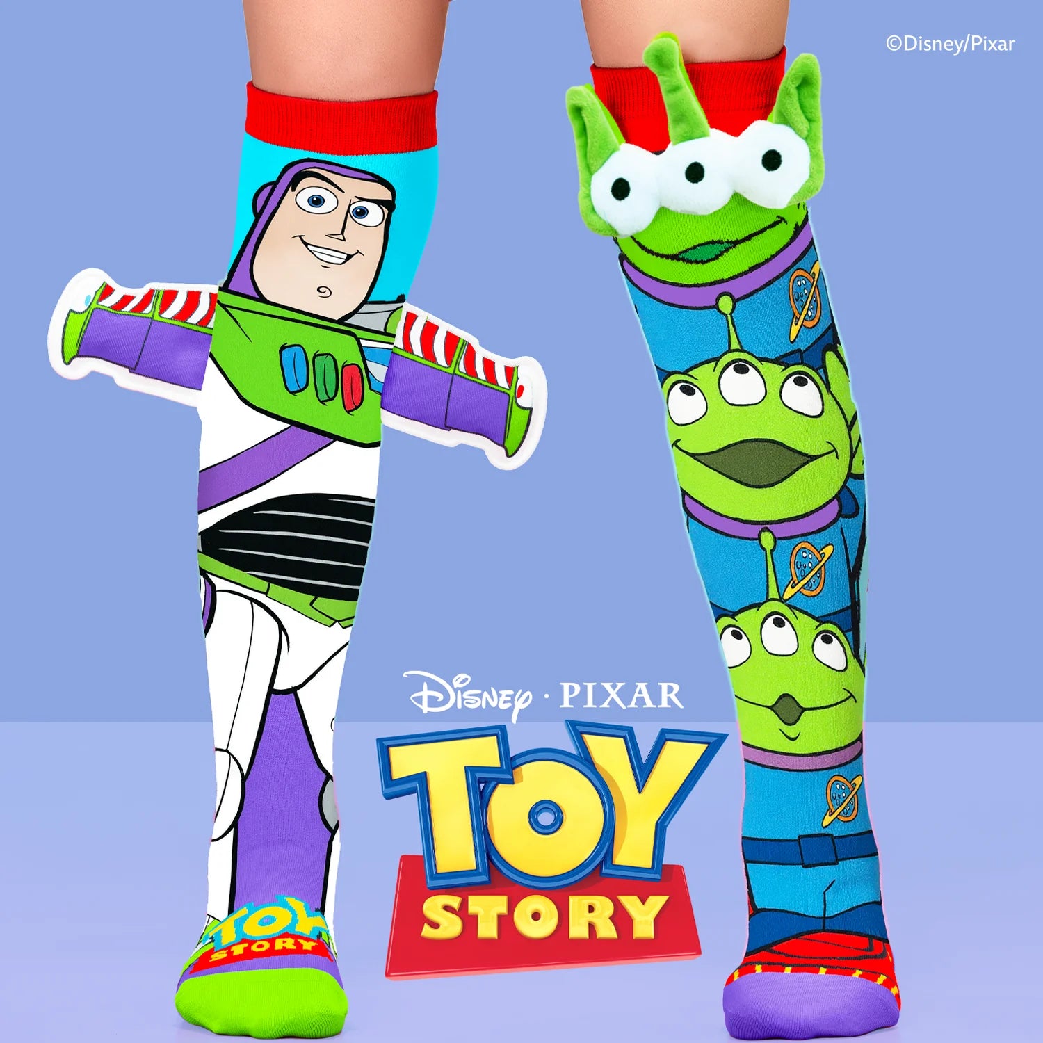 Colorful socks featuring Buzz Lightyear and Alien from Toy Story with Disney Pixar logo on a blue background