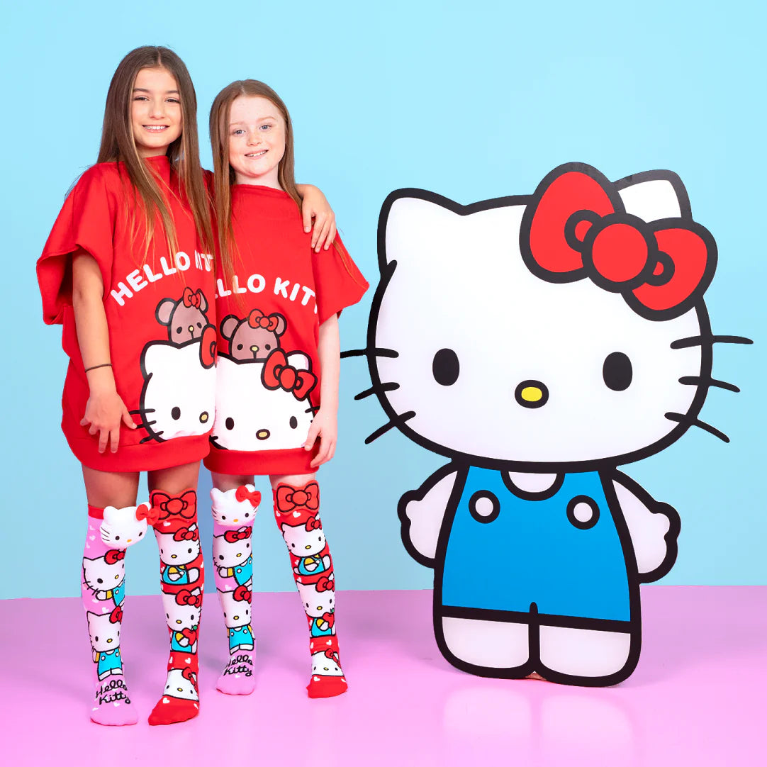 Hello Kitty knee high socks by MADMIA with 3D plush character head and red bow design