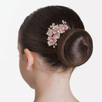 A gorgeous floral sparkly hair piece featuring clear and pink crystals on a small hair comb.  L: 7cm | H: 4cm