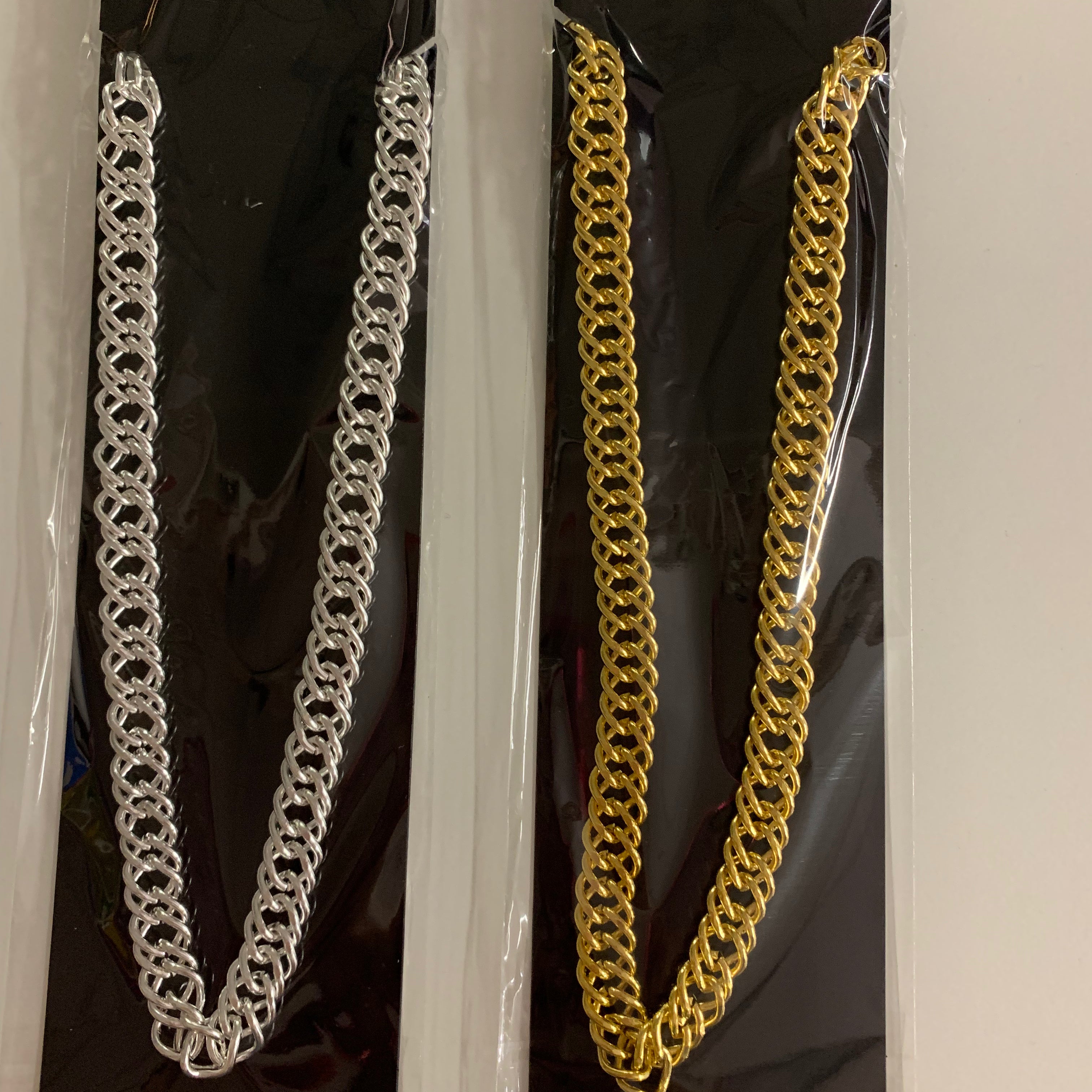 gold or silver chain necklace 1970s pimp disco