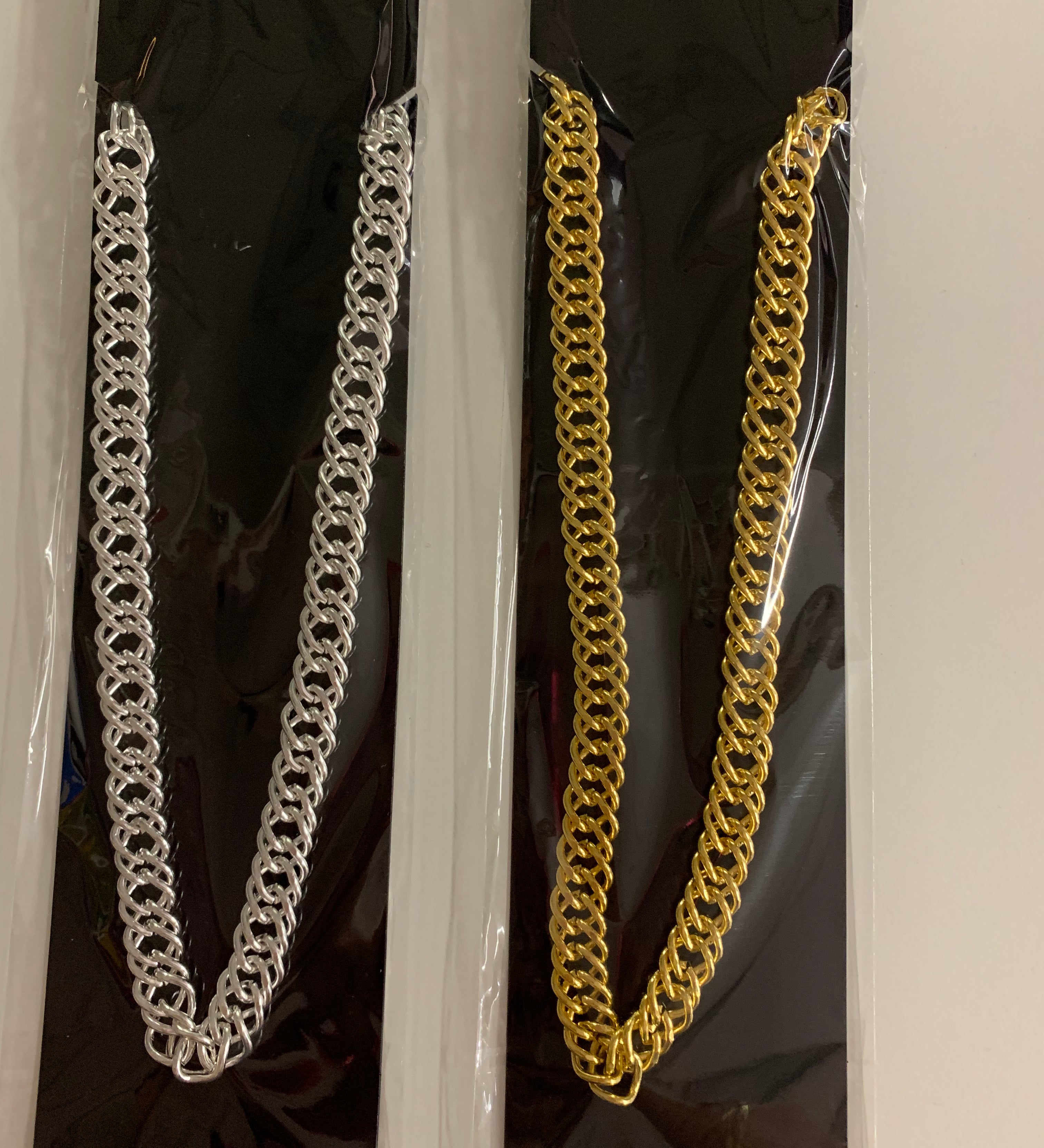 gold or silver chain necklace 1970s pimp disco